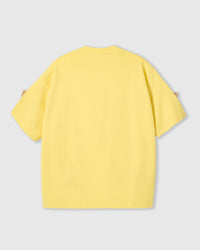 Back view of STICKYZOO lemon Bear T-Shirt showing boxy silhouette and bears peeking at sleeves