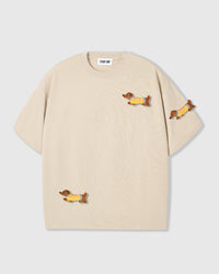 STICKYZOO Dachshund Parade T-Shirt in cream colorway with three hand-stitched plush dachshunds