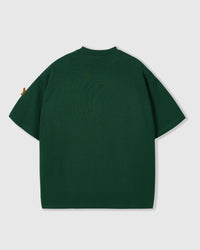 Back view of STICKYZOO forest green Dachshund Parade T-Shirt showing boxy silhouette