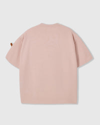 Back view of pink Dash Dachshund T-Shirt showing boxy silhouette and ribbed crew neckline