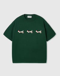 STICKYZOO Spotty Dash Trio T-Shirt in green — three hand-stitched plush spotted dachshund appliqués with red berets