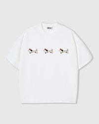 STICKYZOO Spotty Dash Trio T-Shirt in white — three hand-stitched plush spotted dachshund appliqués with red berets