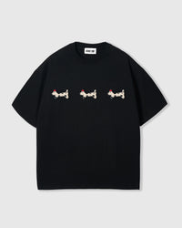 STICKYZOO Spotty Dash Trio T-Shirt in black — three hand-stitched plush spotted dachshund appliqués with red berets on 230gsm cool-touch cotton