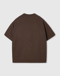 Back view of STICKYZOO Saint Teddy Bear T-Shirt in dark brown showing dropped shoulders and clean silhouette
