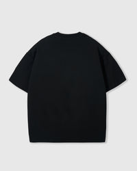 Back view of STICKYZOO Saint Teddy Bear T-Shirt in black showing dropped shoulders