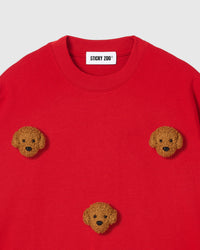 Detail of neckline and plush poodle appliques on red Poodle Parade T-Shirt with brand label