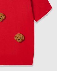 Detail of lower body area on red Poodle Parade T-Shirt showing plush poodle appliques