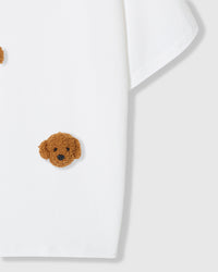 Detail of lower body area on white Poodle Parade T-Shirt showing plush poodle appliques