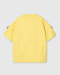 Back view of lemon Poodle Parade T-Shirt showing clean seams and dropped shoulders