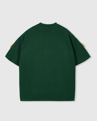 Back view of green Poodle Parade T-Shirt showing clean seams and dropped shoulders