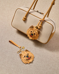 Handmade Chow Chow leather bag charm with 18K gold-plated cube hardware engraved with STICKYZOO — French Alran leather and suede, 7-day artisan build.