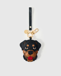 Handmade Rottweiler leather bag charm with 18K gold-plated keychain clip and engraved STICKYZOO gold tag — for keys, bags, and backpacks. French Alran goatskin.