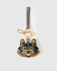 Maison Tabby on an 18K gold-plated keychain clip with engraved STICKYZOO disc — clips to keys, bags or backpacks.