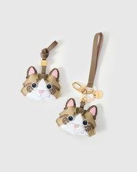Tight close-up of the taupe-strap tabby cat charm face — every detail in real French Alran leather, layered and stitched by hand.