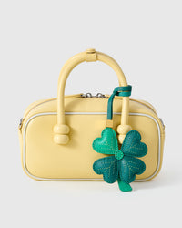 STICKYZOO Lucky Clover Charm — hand-cut, hand-stitched four heart-shaped leaves with hand-stitched vein lines in French Alran goatskin. Designed in Amsterdam.