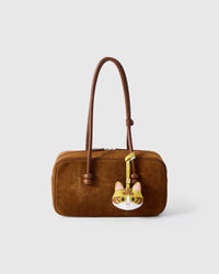 Yellow-Strap Tabby Cat charm styled on a bag — a small, specific piece that turns a simple bag into a personal one.