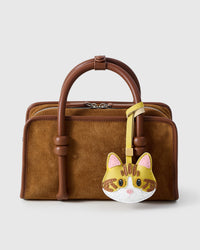 Yellow-Strap Tabby Cat on a bag, side angle — loved by thousands of cat people. Real French leather, 3 days by hand.