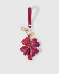 STICKYZOO Lucky Clover Charm — hand-layered French Alran goatskin, four heart-shaped leaves with hand-stitched vein lines. Designed in Amsterdam.