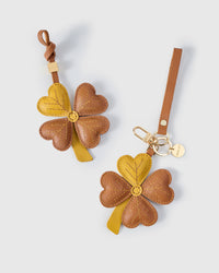 STICKYZOO Lucky Clover Charm in mustard yellow and tan French Alran goatskin. Hand-cut, hand-stitched. Designed in Amsterdam.