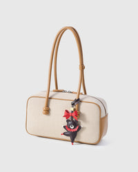 The Parisian Bear charm — real French leather, 3 days by hand.