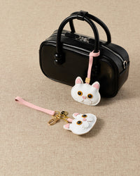 Snowy cat — French Alran leather from Tarn, France, founded 1903, Entreprise du Patrimoine Vivant.
