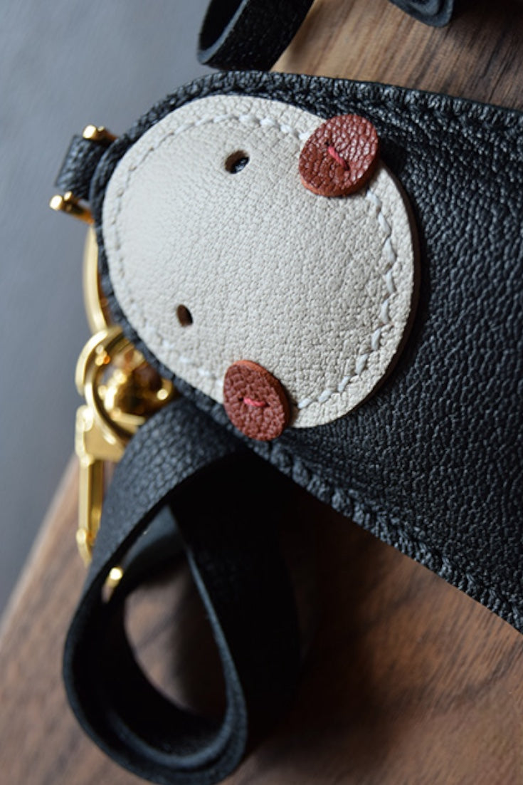 NO FACE CHARM
