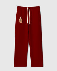 STICKYZOO GINGERBREAD JOY SWEATPANT in red featuring one hand-stitched plush gingerbread appliqué, designed in Amsterdam
