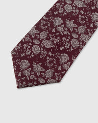 STICKYZOO WINE DITSY TIE — hand-embroidered detail showing silver-tone scattered ditsy floral and leaf motifs, stitched not printed