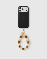 Handmade beaded phone strap on a black case, rated 4.9 across 5,000+ reviews