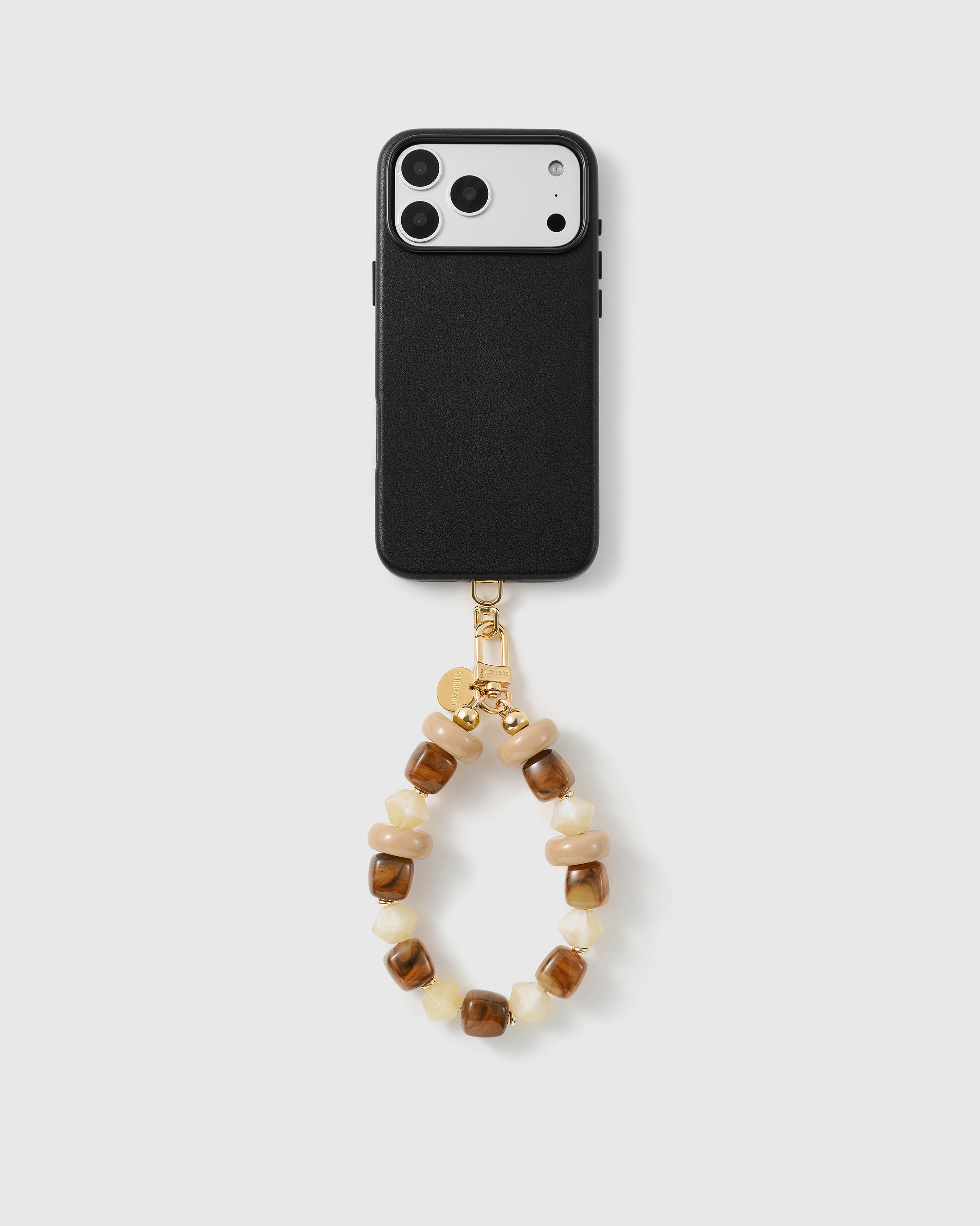 Handmade beaded phone strap on a black case, rated 4.9 across 5,000+ reviews