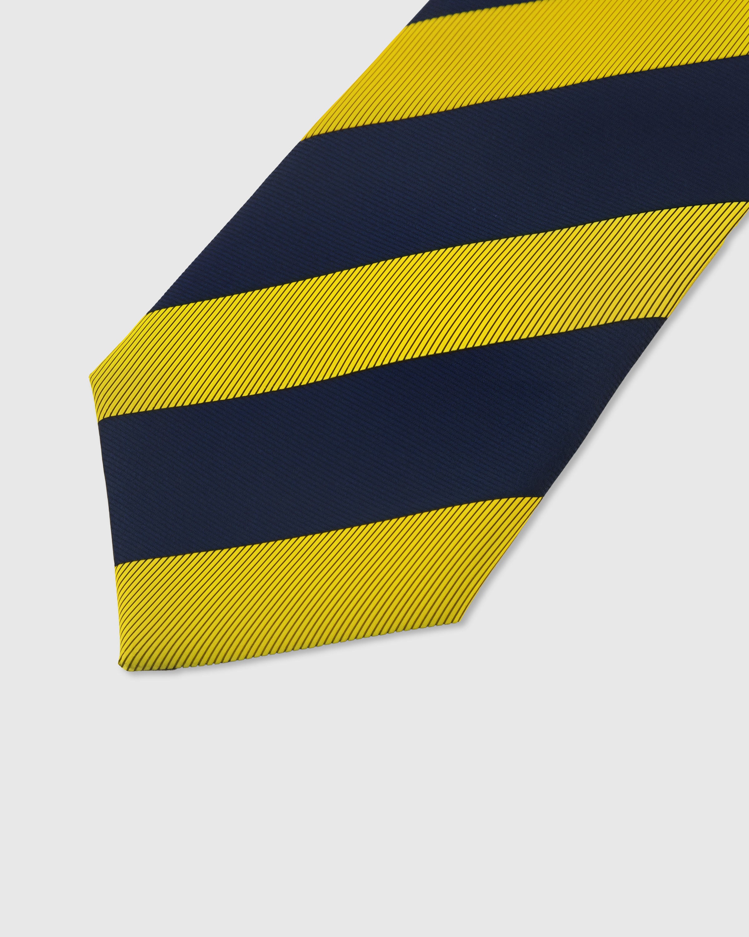 Bold band stripe detail on saffron and navy mulberry silk tie showing raised hand-embroidered thread by STICKYZOO