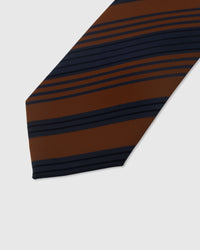 Club stripe detail on cognac and navy mulberry silk tie showing raised hand-embroidered thread by STICKYZOO