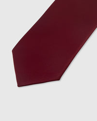 {Solid claret twill texture} Solid detail on claret mulberry silk tie showing embroidered pattern by STICKYZOO