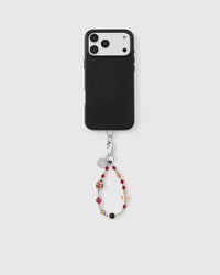 Full phone with red faceted glass bead wristlet attached showing compatibility