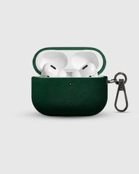 Evergreen Alcantara case open with AirPods Pro inside and suede-lined lid