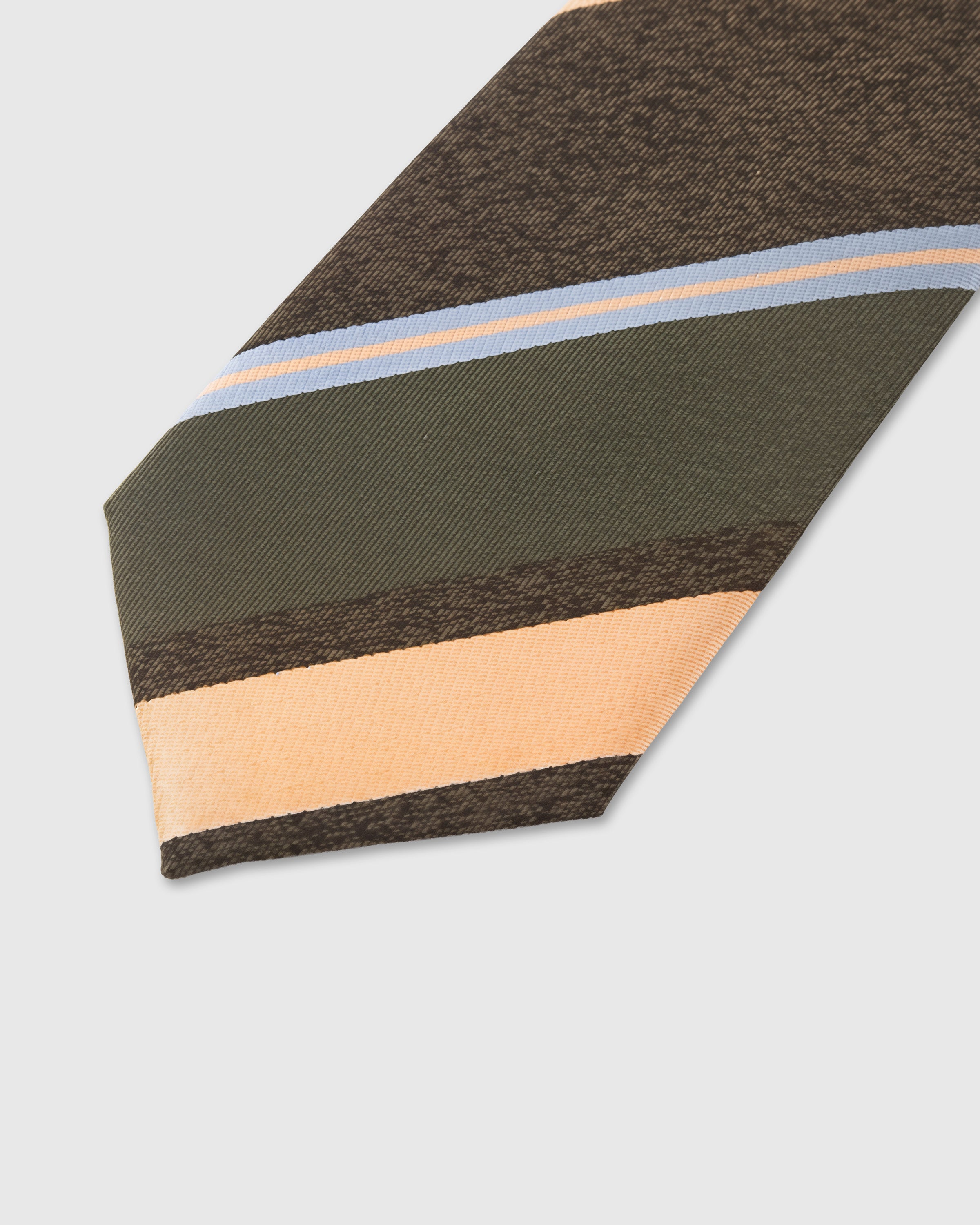 Regimental stripe detail on Ember mulberry silk tie showing raised hand-embroidered thread by STICKYZOO