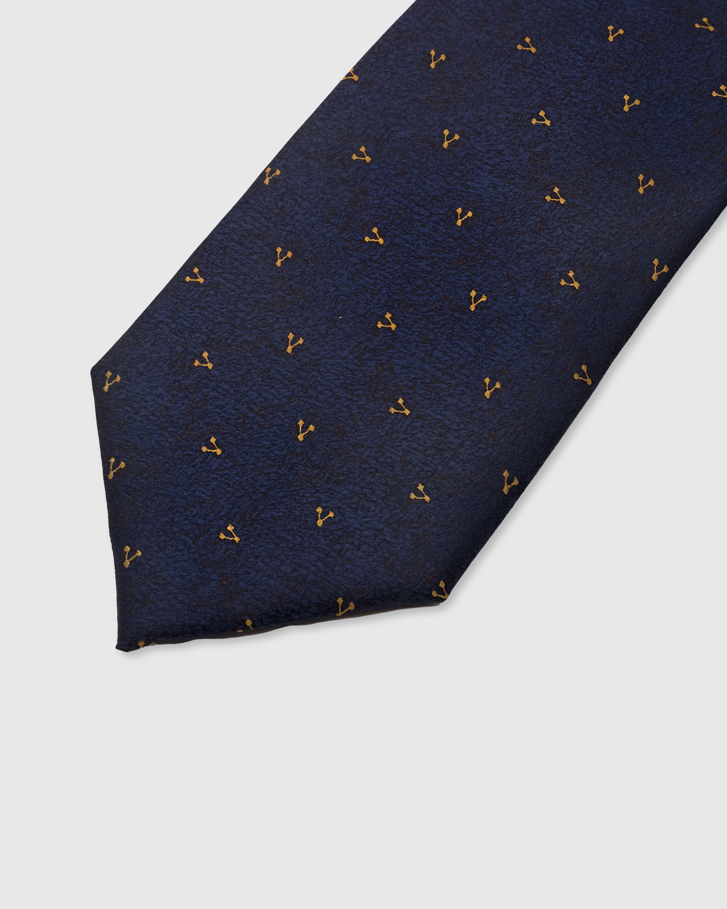 MIDNIGHT SPRIG TIE — 45° Italian bias-cut construction with structured interlining, hand-finished slip stitching visible on interior
