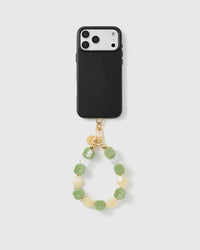 Handmade beaded phone strap on a black case, rated 4.9 across 5,000+ reviews