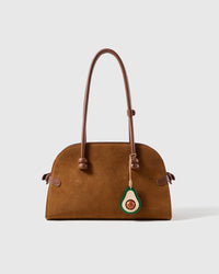 STICKYZOO leather avocado charm shown on a suede handbag, layered French goatskin, handmade over three days