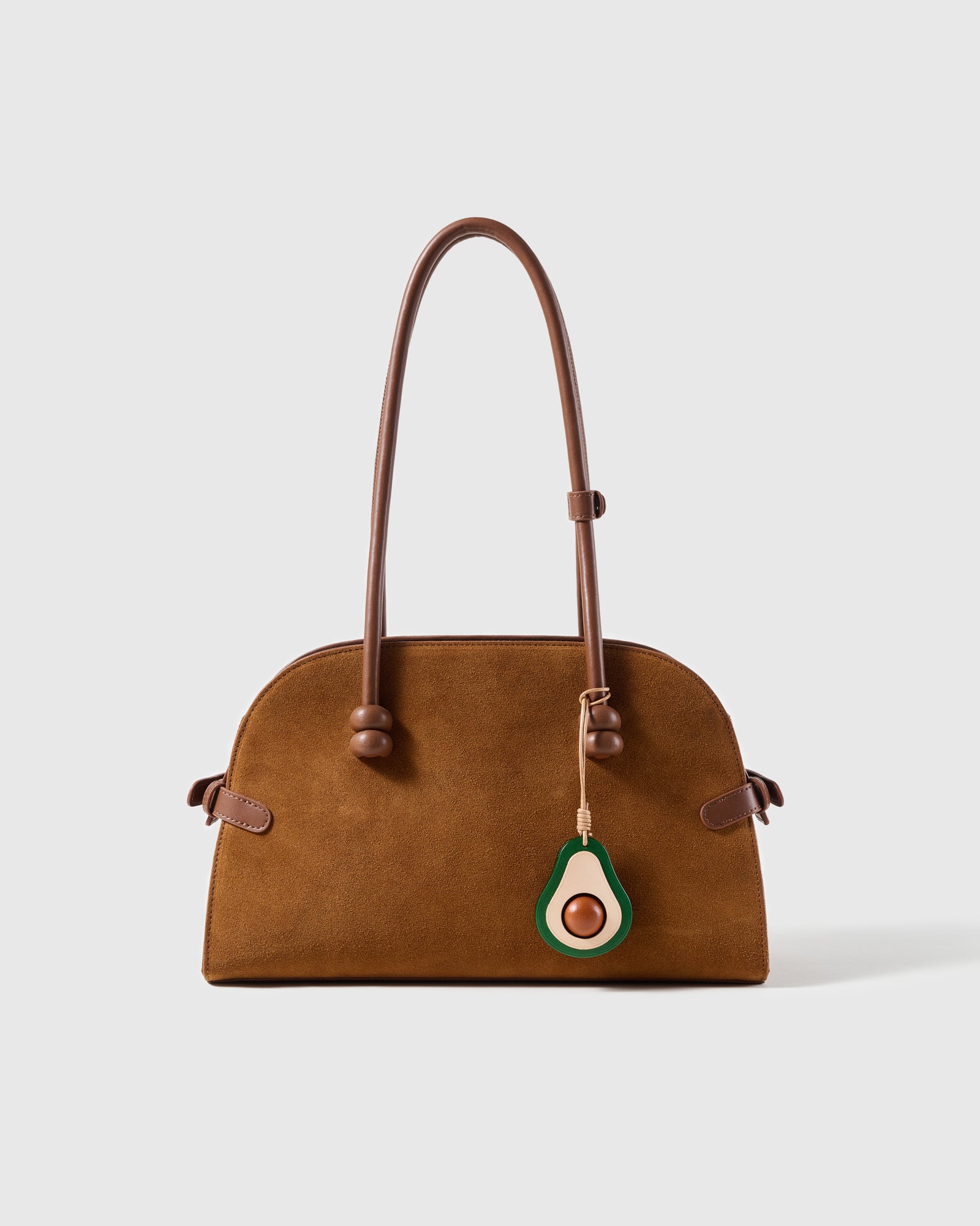 STICKYZOO leather avocado charm shown on a suede handbag, layered French goatskin, handmade over three days