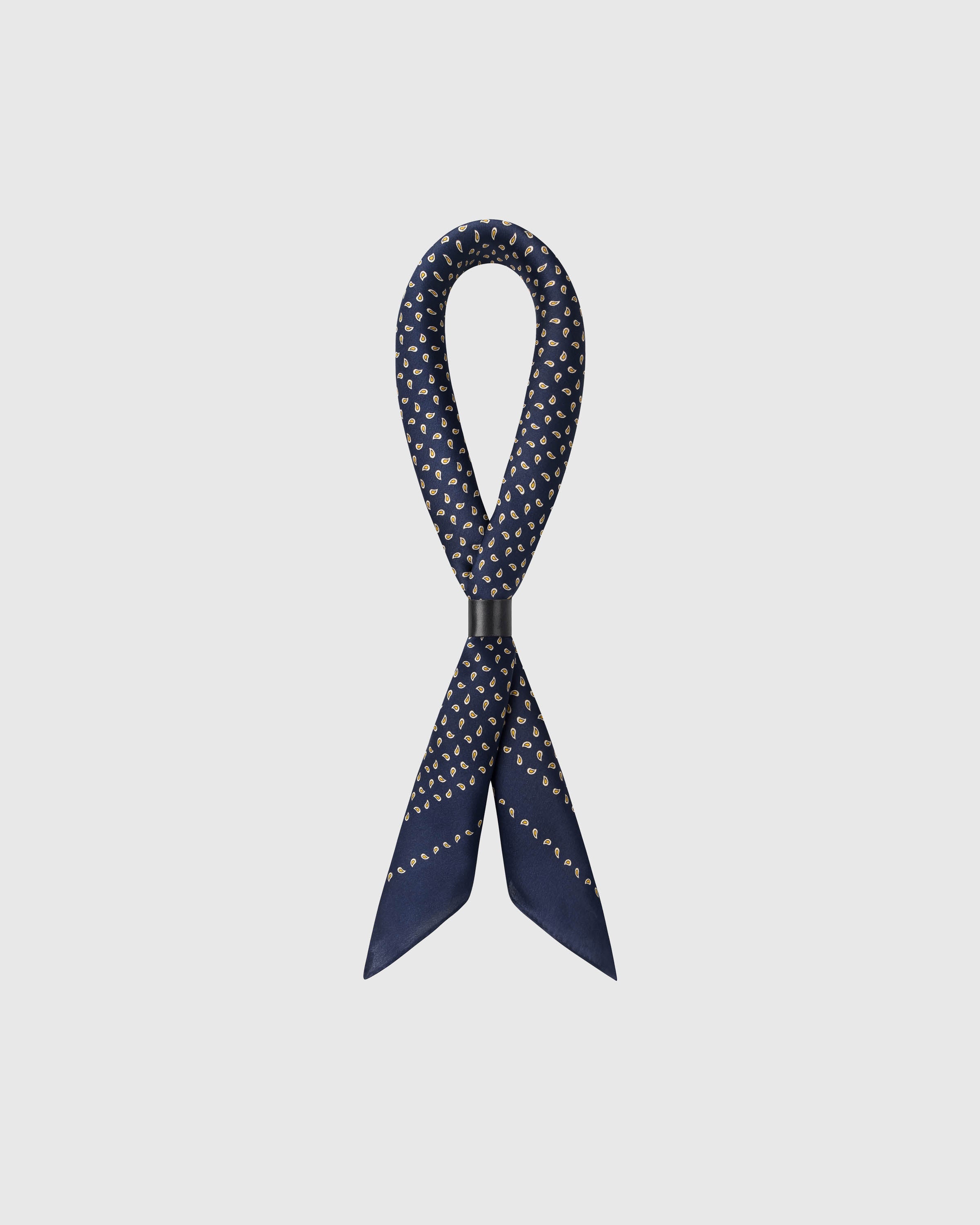 STICKYZOO midnight petal silk scarf looped with a slide showing the scattered gold paisley seeds