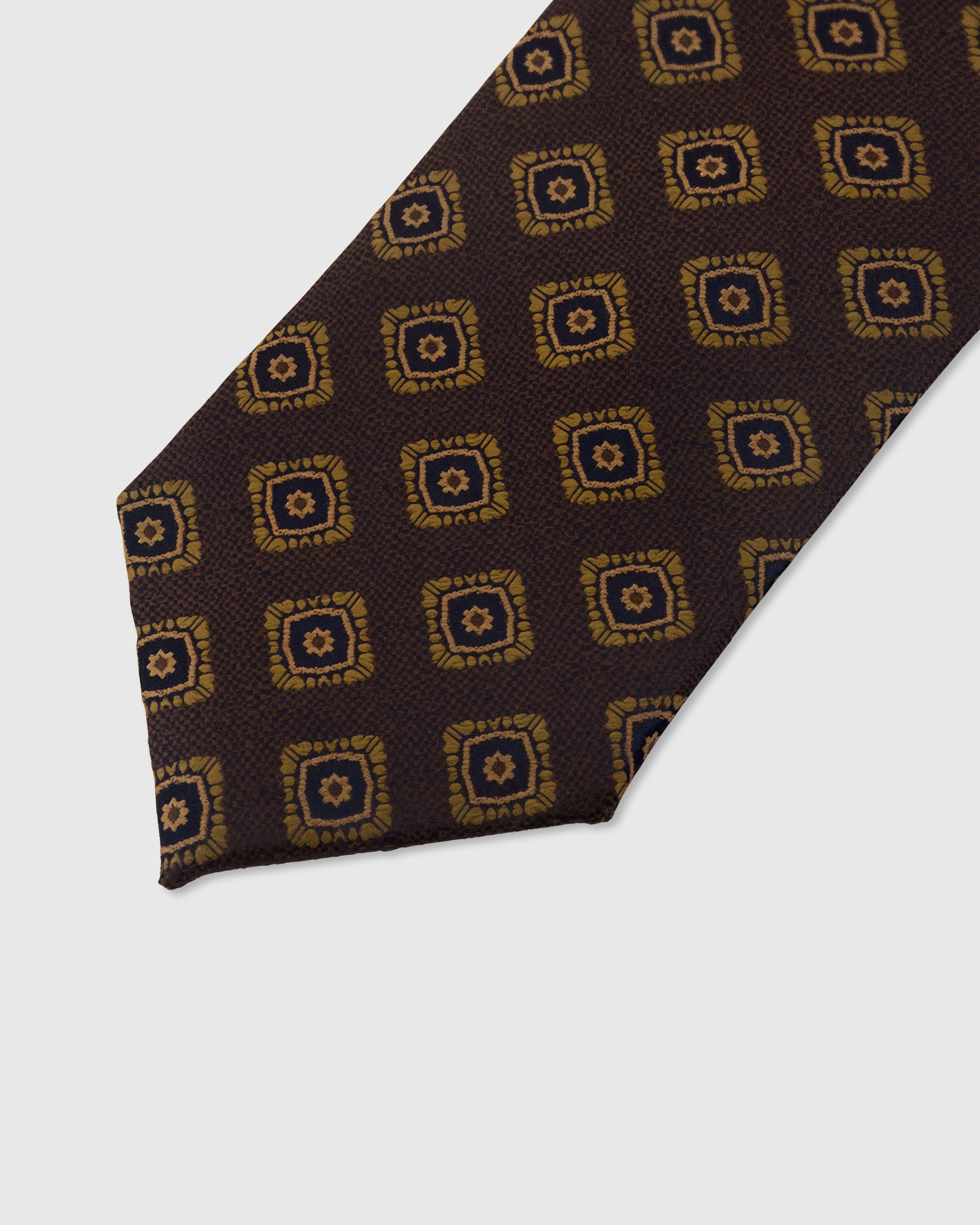 Gold mosaic square detail on chocolate mulberry silk tie showing raised hand-embroidered thread by STICKYZOO