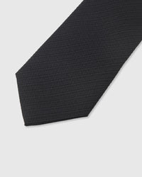 Micro-piqué weave detail on obsidian mulberry silk tie showing surface texture by STICKYZOO