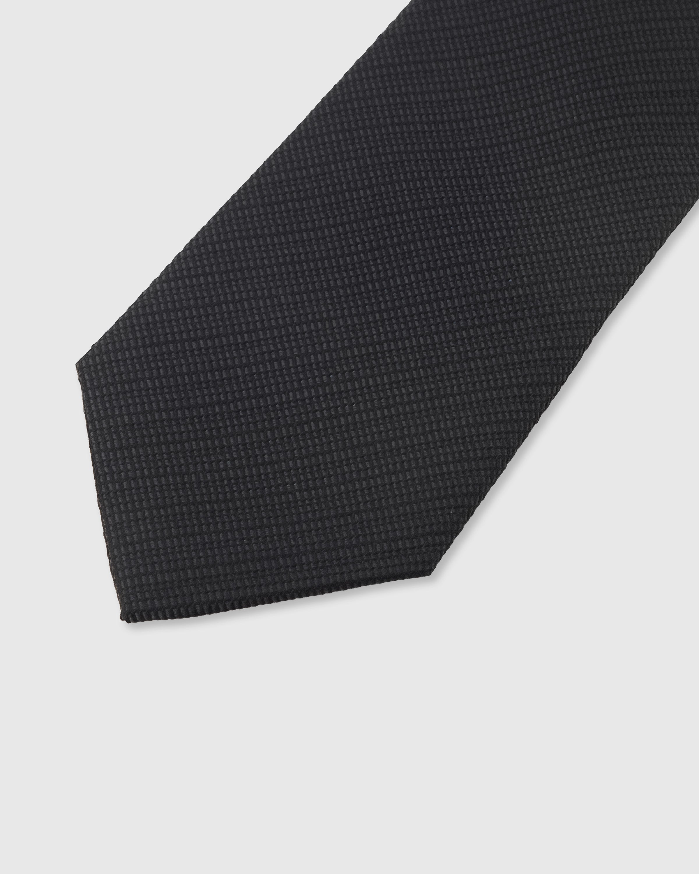 Micro-piqué weave detail on obsidian mulberry silk tie showing surface texture by STICKYZOO