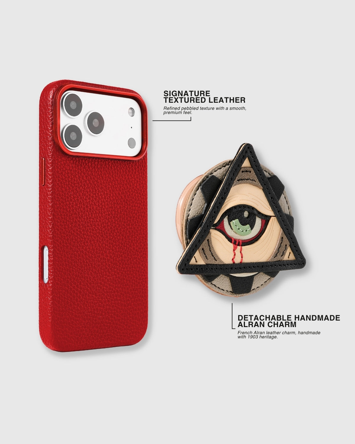 Red textured leather case and detachable handmade French Alran leather all-seeing eye charm shown separately — signature pebbled leather and magnetic MagSafe-compatible charm grip. Rated 4.9 stars.