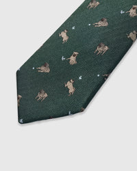 Embroidered, not printed STICKYZOO Pug Play Tie flat blade showing repeating pug dog motifs on green herringbone mulberry silk