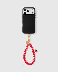 Full phone with ladybug heart strap attached — Rated 4.9 stars by Mia C.