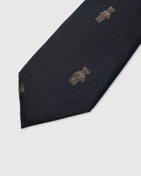 Embroidered, not printed STICKYZOO Noir Terrier Tie flat blade showing repeating terrier dog motifs on black geometric mulberry silk
