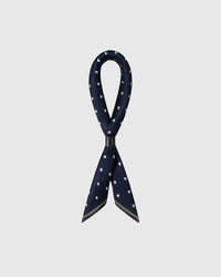 STICKYZOO regatta sailboat silk scarf draped in a ribbon fold with a slim leather slide