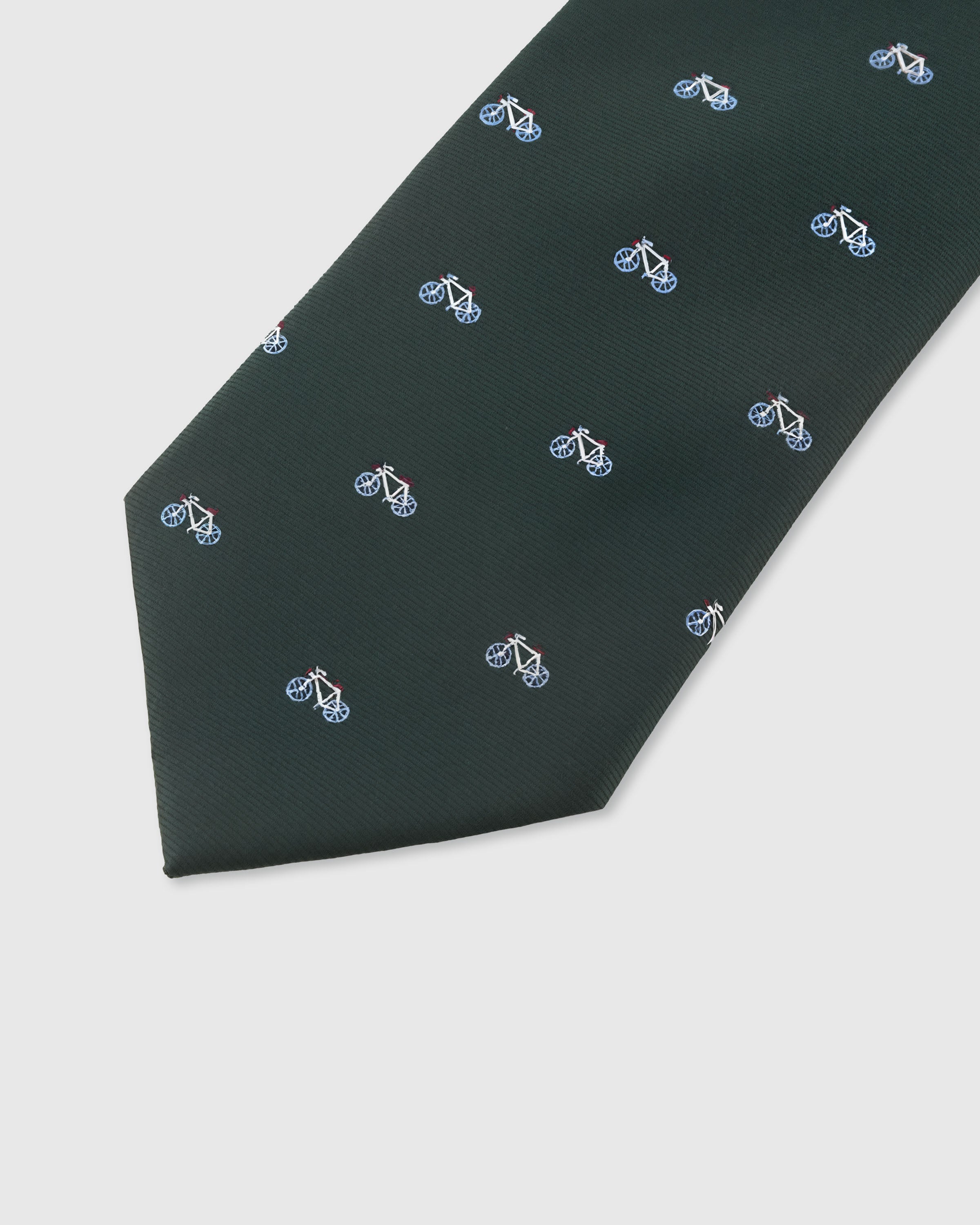 FOREST BICYCLE TIE — 45° Italian bias-cut construction with structured interlining, hand-finished slip stitching visible on interior